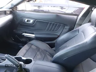 2023 Ford Mustang EcoBoost z VIN 1FA6P8TH2P5110671, wystawiony jako IAAI lot #41745979 z przebiegiem 30 581 mil mil oraz . Historia ofert i sprzedaży dostępna na DreamBid. Obrazek 5.