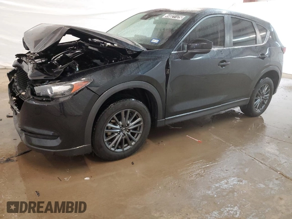 2021 Mazda CX-5 Sport with VIN JM3KFABM4M0334722, listed as a Copart auction lot 44021125 with 64,590 mi miles and Clean Title. Bid and sale history available at carsss.com. Image 1.