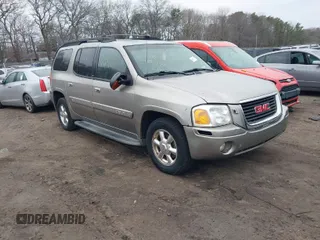 2003 GMC Envoy SLT z VIN 1GKET16S136224928, wystawiony jako IAAI lot #41684104 z przebiegiem Nie podano mil oraz . Historia ofert i sprzedaży dostępna na DreamBid. Obrazek 1.