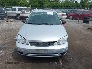 2007 Ford Focus S with VIN 1FAFP34N07W141693, listed as a IAAI auction lot 42310938 with 150,489 mi miles and . Bid and sale history available at DreamBid. Image 12.