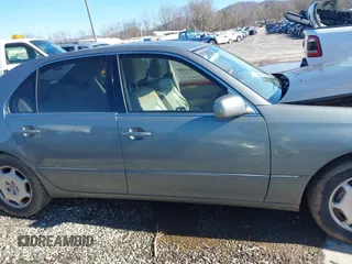 2002 Lexus LS 430 z VIN JTHBN30F820062070, wystawiony jako IAAI lot #41209699 z przebiegiem 154 311 mil mil oraz . Historia ofert i sprzedaży dostępna na DreamBid. Obrazek 13.