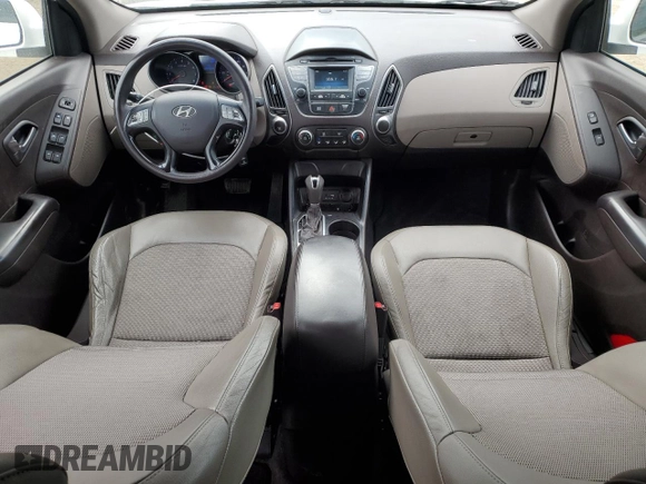 2015 Hyundai Tucson GLS with VIN KM8JT3AF0FU039863, listed as a Copart auction lot 51347815 with 104,469 mi miles and Salvage Title. Bid and sale history available at DreamBid. Image 8.