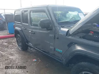 2020 Jeep Wrangler Unlimited Sport Altitude with VIN 1C4HJXDG2LW335228, listed as a IAAI auction lot 41711295 with 43,451 mi miles and . Bid and sale history available at DreamBid. Image 6.