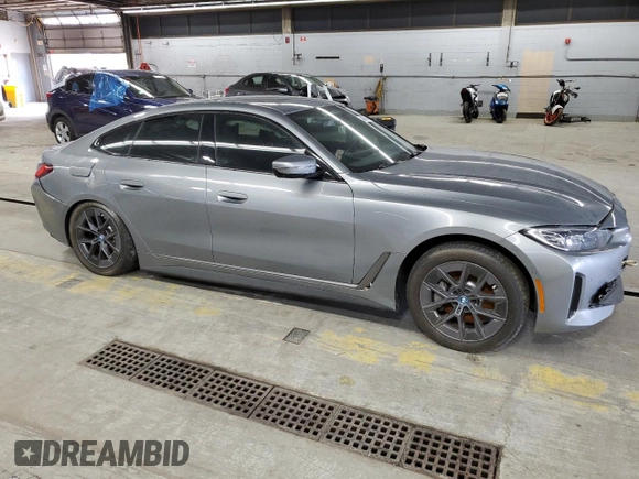 2023 BMW i4 eDrive40 z VIN WBY73AW04PFR09271, wystawiony jako Copart lot #58657405 z przebiegiem Nie podano mil oraz Tytuł czysty. Historia ofert i sprzedaży dostępna na DreamBid. Obrazek 4.