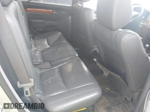 2004 Lexus GX 470 with VIN JTJBT20X140029695, listed as a IAAI auction lot 41960374 with 219,894 mi miles and . Bid and sale history available at DreamBid. Image 8.