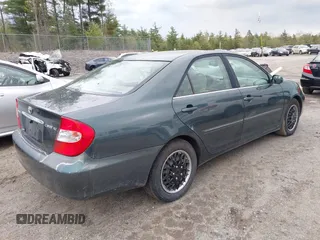 2003 Toyota Camry LE z VIN 4T1BE30K13U746690, wystawiony jako IAAI lot #42220794 z przebiegiem 165 807 mil mil oraz . Historia ofert i sprzedaży dostępna na DreamBid. Obrazek 4.