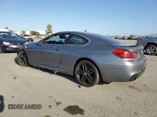 2012 BMW 6 Series 650i z VIN WBALX3C57CC528782, wystawiony jako Copart lot #53036125 z przebiegiem Nie podano mil oraz Szkody całkowita. Historia ofert i sprzedaży dostępna na DreamBid. Obrazek 2.