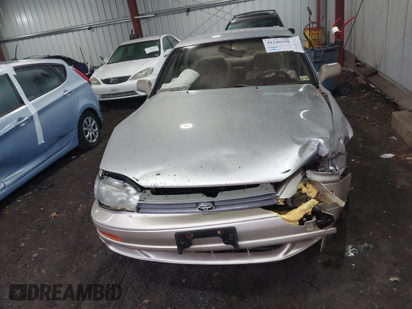 1994 Toyota Camry LE with VIN 4T1SK12E3RU863068, listed as a IAAI auction lot 41246198 with 109,786 mi miles. Bid and sale history available at carsss.com. Image 12.