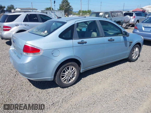 2008 Ford Focus SE z VIN 1FAHP35N58W226540, wystawiony jako IAAI lot #42383245 z przebiegiem 183 312 mil mil oraz . Historia ofert i sprzedaży dostępna na DreamBid. Obrazek 4.