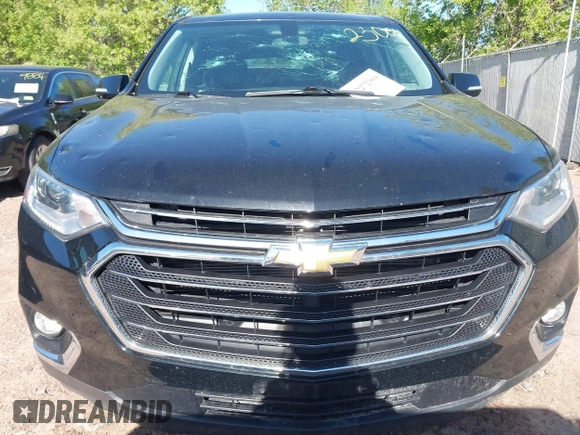 2018 Chevrolet Traverse LT Cloth z VIN 1GNEVGKW1JJ189116, wystawiony jako IAAI lot #42272309 z przebiegiem 111 408 mil mil oraz . Historia ofert i sprzedaży dostępna na DreamBid. Obrazek 12.