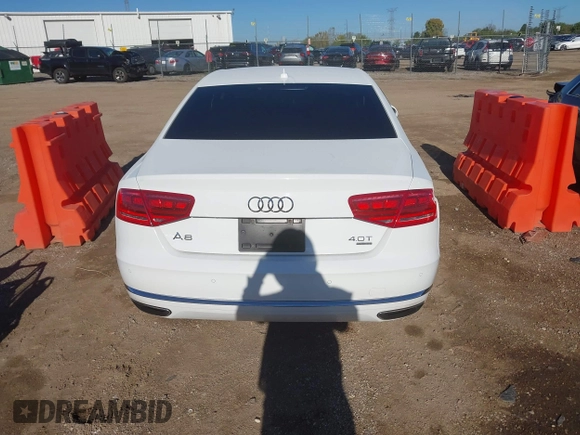 2013 Audi A8 4.0L with VIN WAUA2AFD9DN017867, listed as a IAAI auction lot 40430651 with 114,928 mi miles and . Bid and sale history available at DreamBid. Image 16.