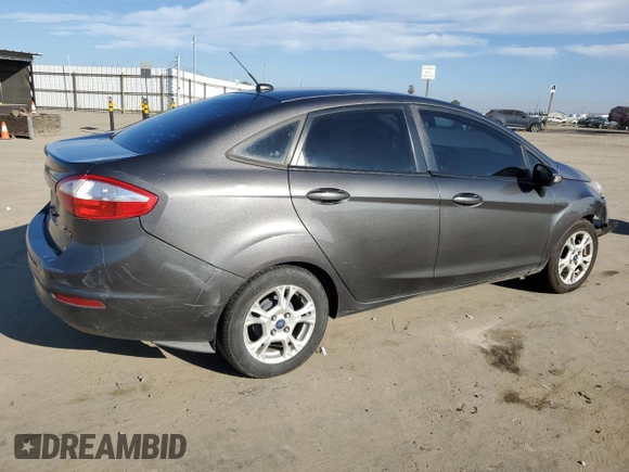 2015 Ford Fiesta SE with VIN 3FADP4BJ0FM115297, listed as a Copart auction lot 87942225 with 198,940 mi miles and Salvage Title. Bid and sale history available at DreamBid. Image 3.