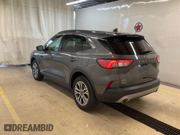 2021 Ford Escape SEL Hybrid z VIN 1FMCU9CZ7MUA83422, wystawiony jako IAAI lot #42743365 z przebiegiem 70 851 mil mil oraz . Historia ofert i sprzedaży dostępna na DreamBid. Obrazek 2.