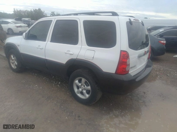2006 Mazda Tribute i with VIN 4F2YZ02Z06KM26613, listed as a IAAI auction lot 41847931 with 145,164 mi miles. Bid and sale history available at carsss.com. Image 3.