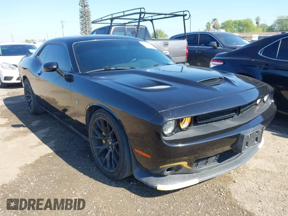 2019 Dodge Challenger R/T Scat Pack z VIN 2C3CDZFJ9KH556896, wystawiony jako IAAI lot #41892608 z przebiegiem 60 747 mil mil oraz . Historia ofert i sprzedaży dostępna na DreamBid. Obrazek 1.