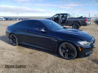2016 BMW M4 with VIN WBS3R9C59GK338082, listed as a Copart auction lot 48574074 with 117,922 mi miles and Clean Title. Bid and sale history available at carsss.com. Image 4.