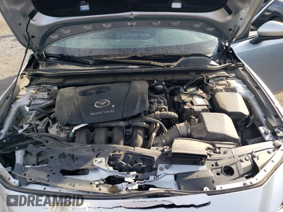 2019 Mazda 3 z VIN 3MZBPABL1KM113924, wystawiony jako Copart lot #54479075 z przebiegiem 116 948 mil mil oraz Szkoda całkowita • Salvage title. Historia ofert i sprzedaży dostępna na DreamBid. Obrazek 11.