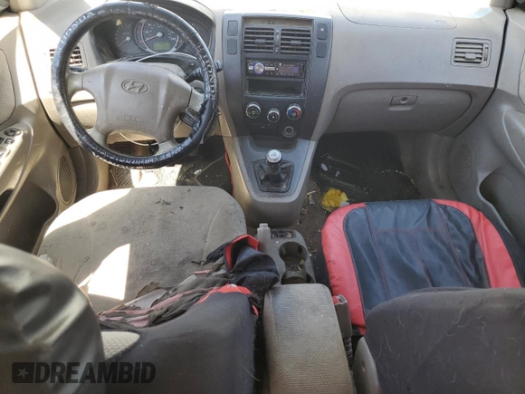 2005 Hyundai Tucson GL with VIN KM8JM12B25U241969, listed as a Copart auction lot 53461165 with 216,197 mi miles and Salvage Title. Bid and sale history available at carsss.com. Image 8.