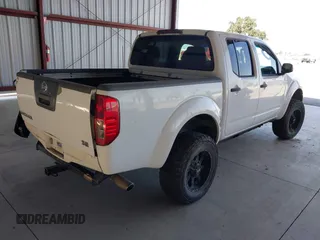 2006 Nissan Frontier SE z VIN 1N6AD07U06C469157, wystawiony jako IAAI lot #42249320 z przebiegiem 189 936 mil mil oraz . Historia ofert i sprzedaży dostępna na DreamBid. Obrazek 4.