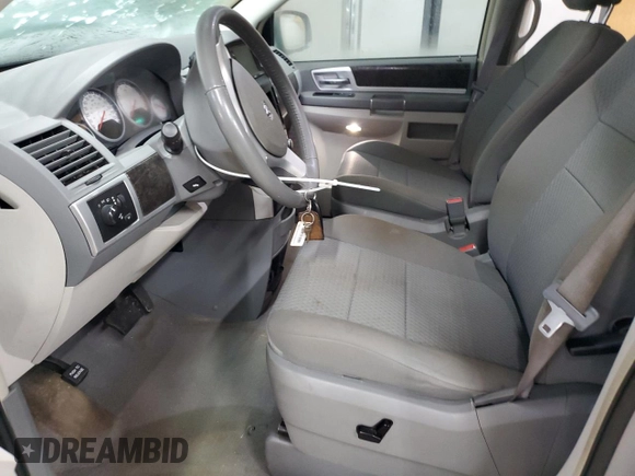 2010 Dodge Grand Caravan Crew with VIN 2D4RN6DX9AR390514, listed as a Copart auction lot 50906305 with 102,729 mi miles and Clean Title. Bid and sale history available at DreamBid. Image 7.