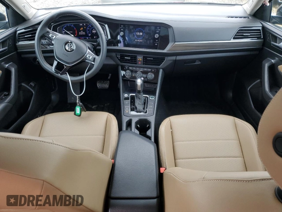 2021 Volkswagen Jetta SEL z VIN 3VWE57BU5MM013374, wystawiony jako Copart lot #58579395 z przebiegiem 50 968 mil mil oraz Czysty tytuł • Clean title. Historia ofert i sprzedaży dostępna na DreamBid. Obrazek 8.