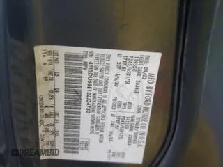 2002 Mercury Mountaineer z VIN 4M2DU66E12ZJ34780, wystawiony jako Copart lot #42529655 z przebiegiem 142 723 mil mil oraz Szkoda całkowita • Salvage title. Historia ofert i sprzedaży dostępna na DreamBid. Obrazek 13.