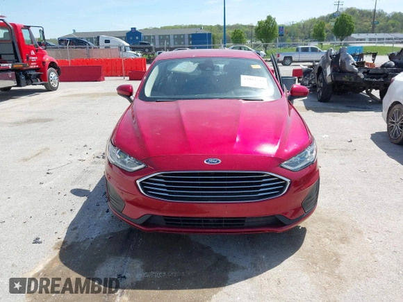 2020 Ford Fusion SE z VIN 3FA6P0HD8LR104422, wystawiony jako IAAI lot #42092244 z przebiegiem 55 438 mil mil oraz . Historia ofert i sprzedaży dostępna na DreamBid. Obrazek 12.
