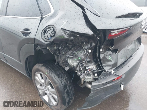 2025 Mazda CX-30 S Carbon Edition z VIN 3MVDMBCM9SM783429, wystawiony jako IAAI lot #42065729 z przebiegiem 4 940 mil mil oraz . Historia ofert i sprzedaży dostępna na DreamBid. Obrazek 6.