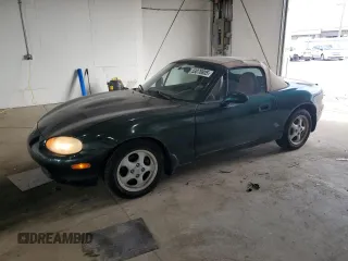 1999 Mazda MX-5 Miata z VIN JM1NB353XX0111850, wystawiony jako Copart lot #53076805 z przebiegiem 128 707 mil mil oraz Szkoda całkowita • Salvage title. Historia ofert i sprzedaży dostępna na DreamBid. Obrazek 1.