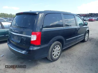2016 Chrysler Town & Country Touring with VIN 2C4RC1BG8GR297243, listed as a IAAI auction lot 42143705 with 140,728 mi miles. Bid and sale history available at carsss.com. Image 4.
