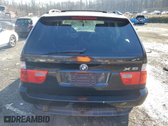 2005 BMW X5 3.0i with VIN 5UXFA13555LY21474, listed as a Copart auction lot 82994644 with 0 mi miles and Salvage Title. Bid and sale history available at carsss.com. Image 6.