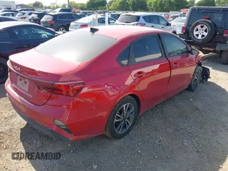 2022 Kia Forte LXS with VIN 3KPF24AD0NE462828, listed as a IAAI auction lot 42019108 with 25,536 mi miles and . Bid and sale history available at DreamBid. Image 4.