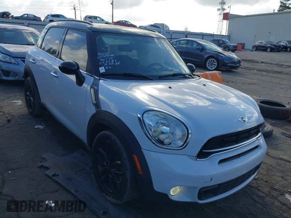 2015 MINI Countryman S with VIN WMWZC3C5XFWT06360, listed as a IAAI auction lot 40774863 with 127,383 mi miles and . Bid and sale history available at DreamBid. Image 1.