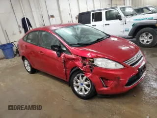 2012 Ford Fiesta SE with VIN 3FADP4BJ1CM147493, listed as a Copart auction lot 51436635 with 166,121 mi miles and Salvage Title. Bid and sale history available at DreamBid. Image 4.