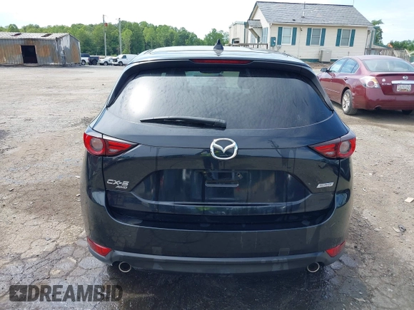 2018 Mazda CX-5 Grand Touring z VIN JM3KFBDM5J0307785, wystawiony jako IAAI lot #42302609 z przebiegiem 81 974 mil mil oraz . Historia ofert i sprzedaży dostępna na DreamBid. Obrazek 17.