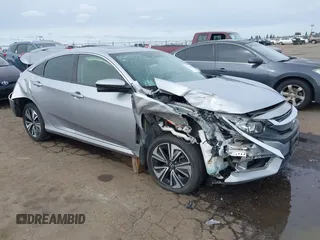 2018 Honda Civic EX-L z VIN JHMFC1F87JX020497, wystawiony jako IAAI lot #41718094 z przebiegiem 77 426 mil mil oraz . Historia ofert i sprzedaży dostępna na DreamBid. Obrazek 1.