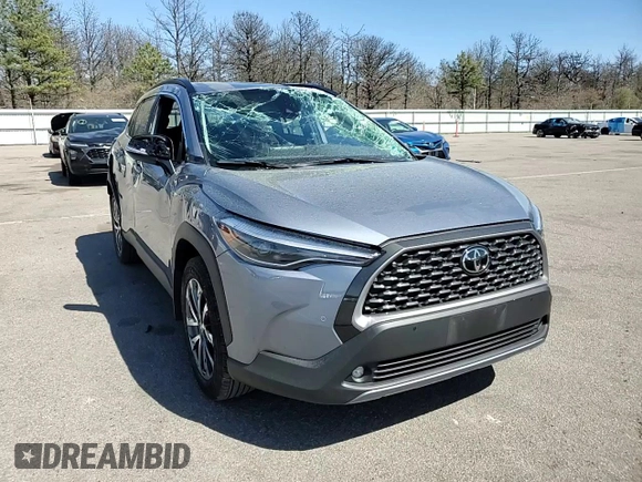 2022 Toyota Corolla Cross XLE z VIN 7MUDAABGXNV042300, wystawiony jako Copart lot #55034815 z przebiegiem 10 457 mil mil oraz Szkoda całkowita • Salvage title. Historia ofert i sprzedaży dostępna na DreamBid. Obrazek 13.