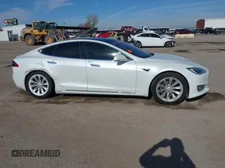 2020 Tesla Model S Long Range with VIN 5YJSA1E23LF360441, listed as a IAAI auction lot 41312865 with 68,967 mi miles and . Bid and sale history available at DreamBid. Image 13.