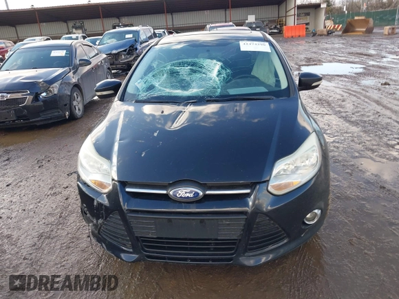 2013 Ford Focus SE z VIN 1FADP3F27DL342384, wystawiony jako IAAI lot #41474290 z przebiegiem 125 664 mil mil oraz . Historia ofert i sprzedaży dostępna na DreamBid. Obrazek 13.