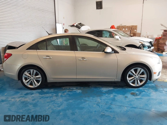 2011 Chevrolet Cruze LTZ with VIN 1G1PH5S9XB7251370, listed as a IAAI auction lot 41984010 with 161,163 mi miles and . Bid and sale history available at DreamBid. Image 13.