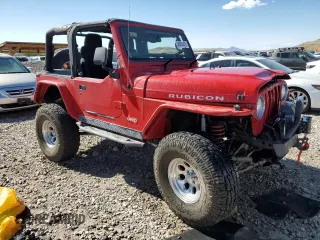 2003 Jeep Wrangler Rubicon z VIN 1J4FA69S93P352899, wystawiony jako Copart lot #56054425 z przebiegiem 3761 mil mil oraz Szkoda całkowita • Salvage title. Historia ofert i sprzedaży dostępna na DreamBid. Obrazek 4.