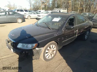 2007 Hyundai Azera SE with VIN KMHFC46F57A155356, listed as a IAAI auction lot 39429413 with 146,313 mi miles. Bid and sale history available at carsss.com. Image 2.