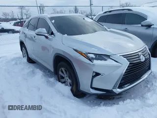 2016 Lexus RX 350 z VIN 2T2BZMCA4GC016479, wystawiony jako IAAI lot #41188946 z przebiegiem 143 100 mil mil oraz . Historia ofert i sprzedaży dostępna na DreamBid. Obrazek 1.