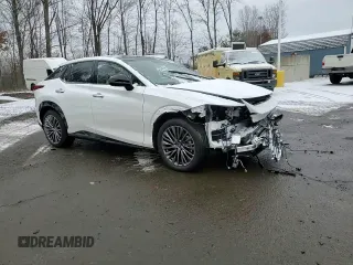 2024 Lexus RZ 450e Premium z VIN JTJAAAABXRA025712, wystawiony jako Copart lot #86183394 z przebiegiem 3 799 mil mil oraz Szkoda całkowita • Salvage title. Historia ofert i sprzedaży dostępna na DreamBid. Obrazek 11.