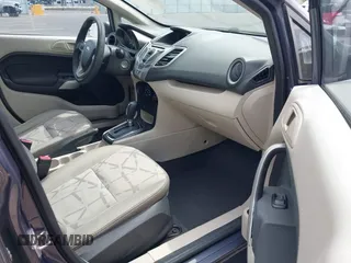 2013 Ford Fiesta SE z VIN 3FADP4BJ3DM186569, wystawiony jako IAAI lot #42128913 z przebiegiem 19 228 mil mil oraz . Historia ofert i sprzedaży dostępna na DreamBid. Obrazek 5.