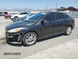 2017 Ford Focus SE z VIN 1FADP3F23HL263736, wystawiony jako Copart lot #56253295 z przebiegiem 89 367 mil mil oraz Szkoda całkowita • Salvage title. Historia ofert i sprzedaży dostępna na DreamBid. Obrazek 1.