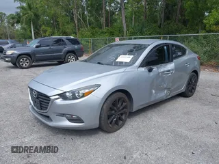 2017 Mazda 3 Touring with VIN 3MZBN1V76HM108148, listed as a IAAI auction lot 41911568 with 194,363 mi miles and . Bid and sale history available at DreamBid. Image 2.