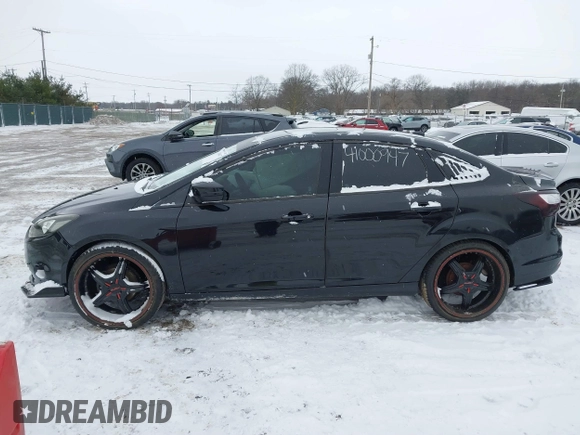 2013 Ford Focus SE z VIN 1FADP3F28DL337355, wystawiony jako IAAI lot #41000947 z przebiegiem 139 456 mil mil oraz . Historia ofert i sprzedaży dostępna na DreamBid. Obrazek 14.