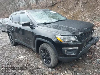 2021 Jeep Compass Freedom with VIN 3C4NJDAB4MT591792, listed as a IAAI auction lot 41580847 with 64,331 mi miles and . Bid and sale history available at carsss.com. Image 1.