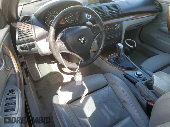 2008 BMW 1 Series 128i with VIN WBAUL73578VE88077, listed as a Copart auction lot 48655115 with 142,931 mi miles and Salvage title. Bid and sale history available at DreamBid. Image 8.